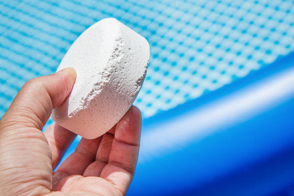 Chlorine tablets resembling chalk used for pool water treatment.